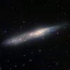 Pirmajā attēlā redzama neregulārā galaktika NGC 55