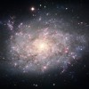 Otrajā attēlā redzama vēl viena Skulptora grupas galaktika - NGC 7793