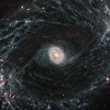 Spirālveida galaktika NGC 1433; Autortiesības: NASA, ESA, CSA, and J. Lee (NOIRLab), A. Pagan (STScI