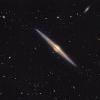 NGC 4565 - galaktika uz malas